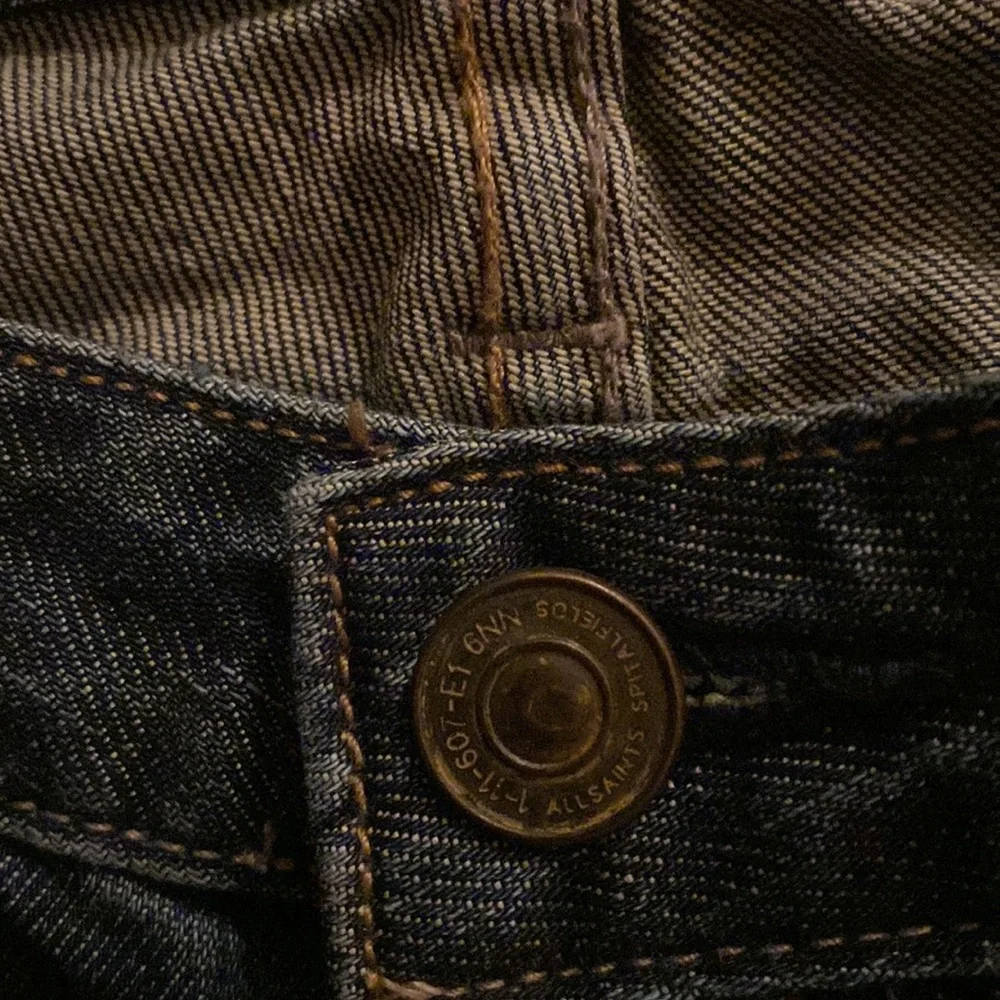 All Saints Spitalfields Jack’s Place skinny dark blue jeans from Neiman Marcus